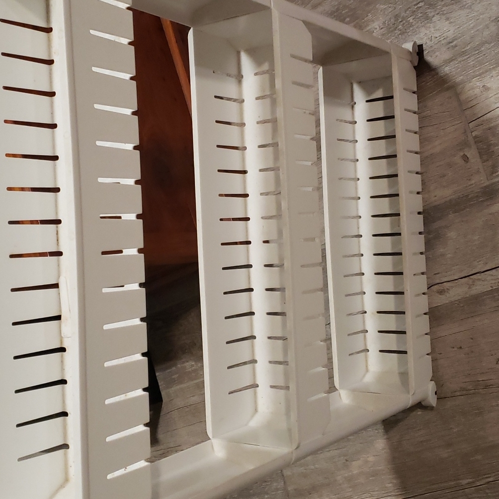 Storage shelf for in between a washer and dryer or small space